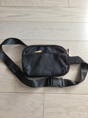 Zorfin Sleek Black Women's Crossbody Belt Bag with Gold Accents